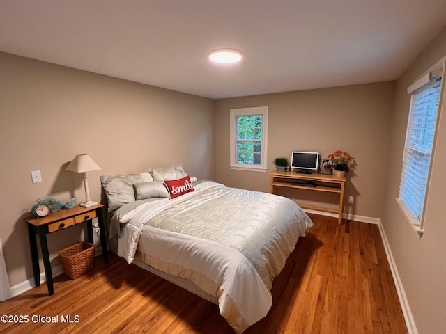 19 Canterbury Rd, Clifton Park, NY 12065 - bedroom with baseboards and light wood-type flooring