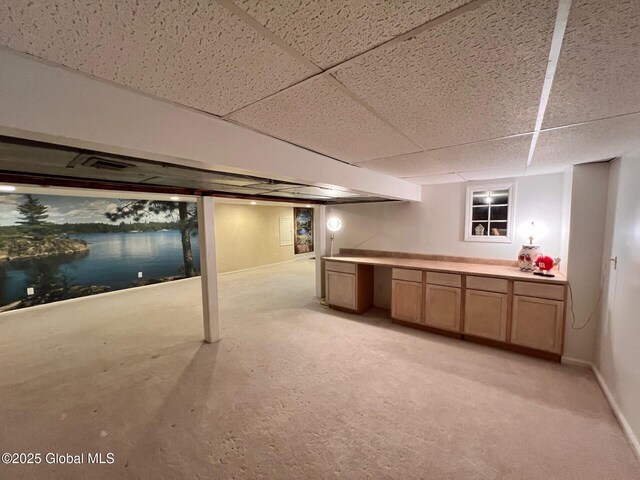 19 Canterbury Rd, Clifton Park, NY 12065 - finished below grade area featuring a paneled ceiling and light colored carpet