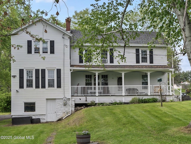 202 Steadwell Rd, Amsterdam, NY 12010 - view of front facade with a chimney, a front lawn, covered porch, and a shingled roof