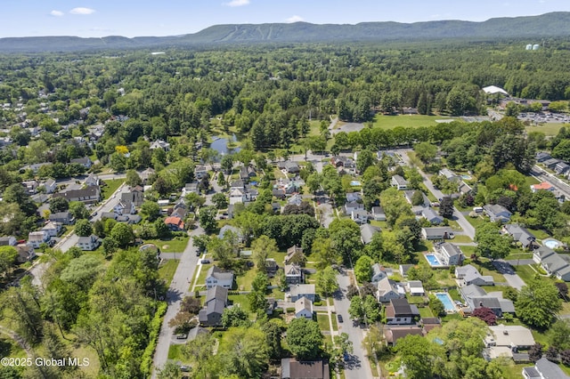 30 Monument Ave, Glens Falls, NY 12801 - view of property location with a forest, mountains, and nearby suburban area
