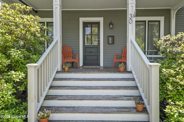 30 Monument Ave, Glens Falls, NY 12801 - entrance to property featuring a porch