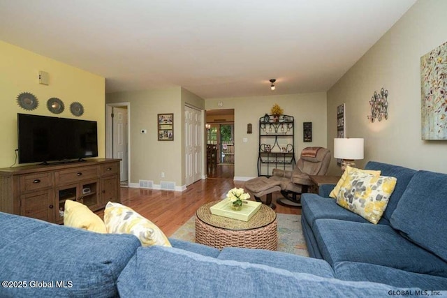 198 Williamsburg Ct, Albany, NY 12203 - living room featuring wood finished floors and baseboards