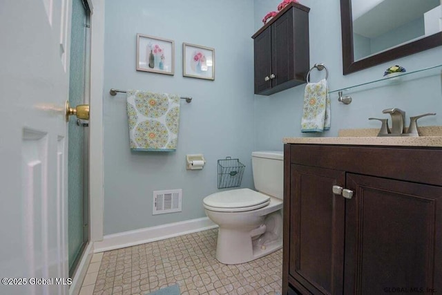 198 Williamsburg Ct, Albany, NY 12203 - bathroom with vanity, baseboards, toilet, and a shower with door