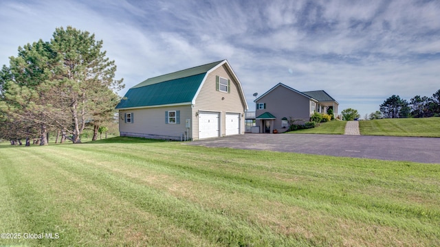 127 Firefly Meadow Rd, Glen, NY 12072 - view of property exterior featuring a gambrel roof, a lawn, metal roof, and driveway