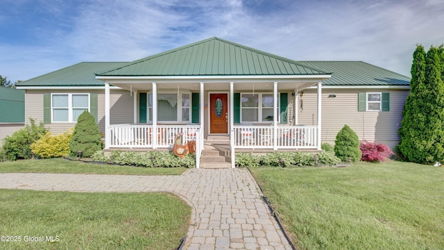 127 Firefly Meadow Rd, Glen, NY 12072 - view of front of house featuring covered porch, a front yard, and metal roof