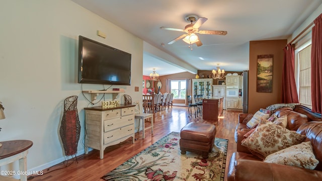 127 Firefly Meadow Rd, Glen, NY 12072 - living area featuring a chandelier, lofted ceiling, ceiling fan, light wood-style flooring, and baseboards