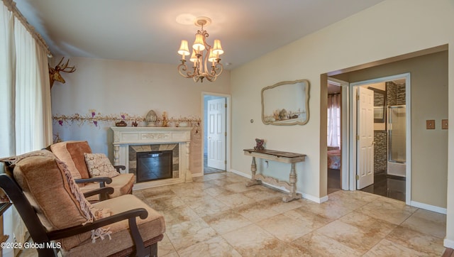 127 Firefly Meadow Rd, Glen, NY 12072 - living area with a tiled fireplace, a chandelier, and baseboards