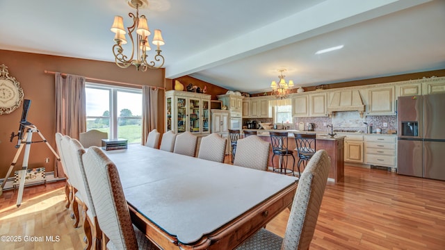 127 Firefly Meadow Rd, Glen, NY 12072 - dining room with a chandelier, healthy amount of natural light, beamed ceiling, and light wood-style floors