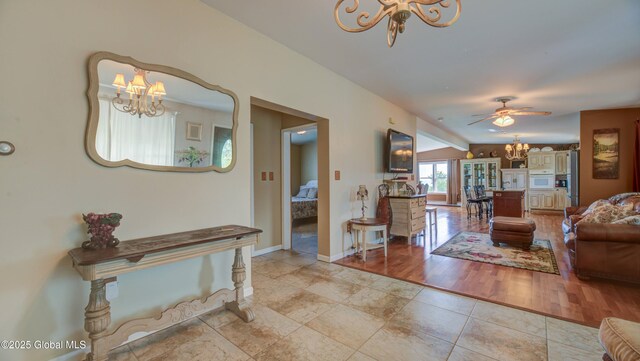127 Firefly Meadow Rd, Glen, NY 12072 - living room with a chandelier, baseboards, and a ceiling fan
