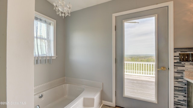 127 Firefly Meadow Rd, Glen, NY 12072 - full bath with a garden tub and a chandelier