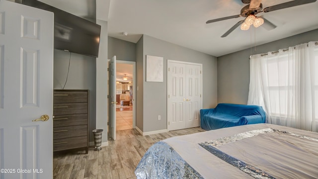 127 Firefly Meadow Rd, Glen, NY 12072 - bedroom featuring light wood-type flooring, baseboards, a closet, lofted ceiling, and ceiling fan