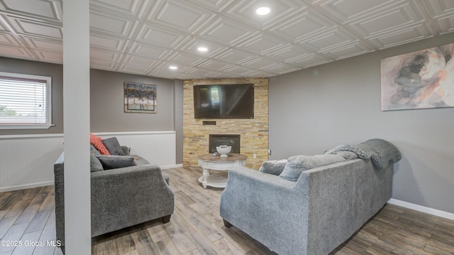 127 Firefly Meadow Rd, Glen, NY 12072 - living area featuring wood finished floors, recessed lighting, an ornate ceiling, baseboards, and a fireplace