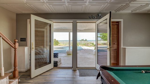 127 Firefly Meadow Rd, Glen, NY 12072 - entryway with wainscoting, stairway, billiards, and light wood-style flooring