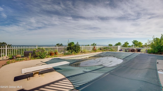 127 Firefly Meadow Rd, Glen, NY 12072 - view of swimming pool featuring a diving board, a fenced backyard, a patio area, and a water view