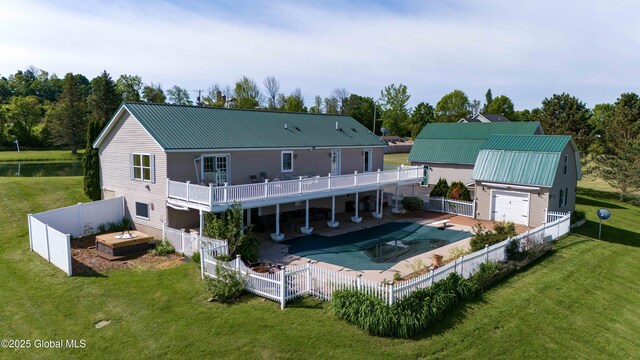 127 Firefly Meadow Rd, Glen, NY 12072 - rear view of property with metal roof, a garage, and a patio area