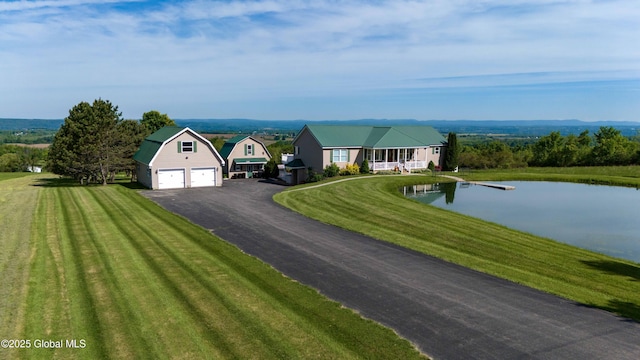 127 Firefly Meadow Rd, Glen, NY 12072 - view of front facade featuring a gambrel roof, a water view, a front yard, an outbuilding, and a garage