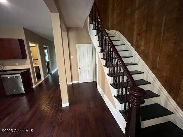 201 10th St, Troy, NY 12180 - stairway with wood finished floors and baseboards