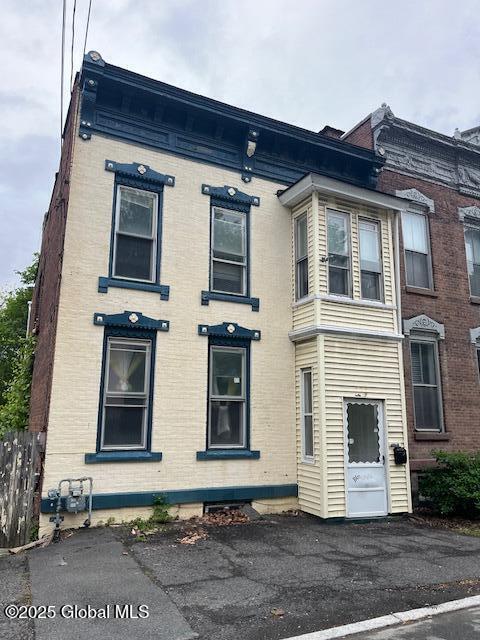 201 10th St, Troy, NY 12180 - view of side of property with brick siding