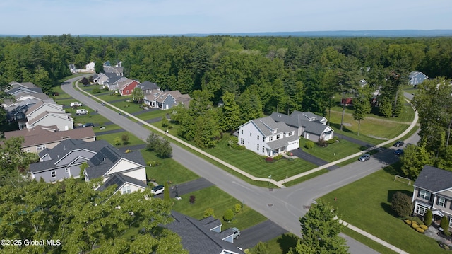 26 Galleon Dr Unit 26, Malta, NY 12020 - aerial view of property and surrounding area featuring a forest and nearby suburban area
