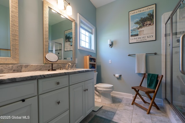 26 Galleon Dr Unit 26, Malta, NY 12020 - full bath with a shower stall, vanity, toilet, and baseboards
