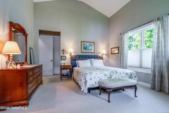 26 Galleon Dr Unit 26, Malta, NY 12020 - bedroom with light colored carpet and high vaulted ceiling