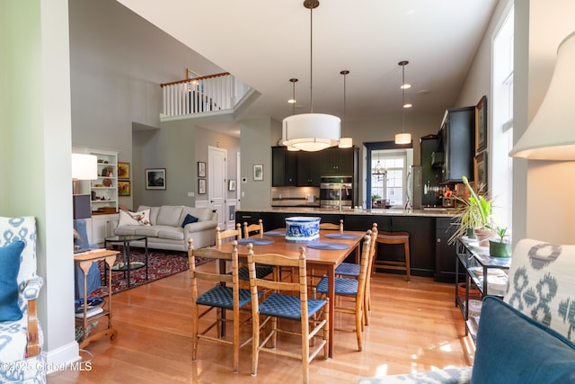 26 Galleon Dr Unit 26, Malta, NY 12020 - dining space with light wood-style floors