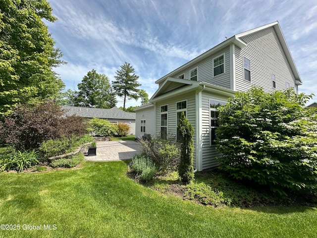 26 Galleon Dr Unit 26, Malta, NY 12020 - view of green lawn featuring a patio