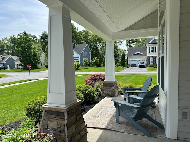 26 Galleon Dr Unit 26, Malta, NY 12020 - porch featuring a lawn and a residential view