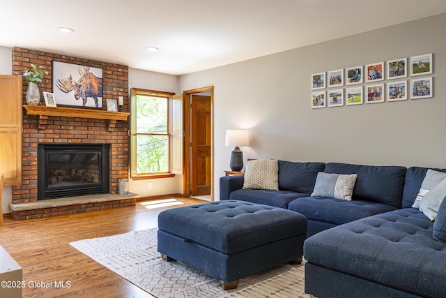 844 Red Oak Dr, Niskayuna, NY 12309 - living area featuring wood finished floors, a brick fireplace, and recessed lighting