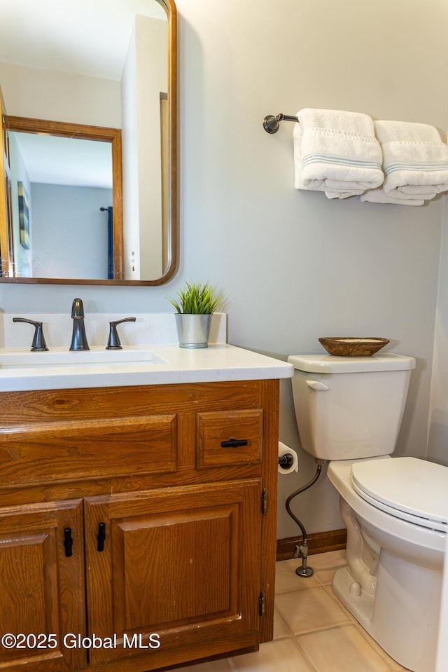 844 Red Oak Dr, Niskayuna, NY 12309 - bathroom with vanity, toilet, tile patterned floors, and baseboards
