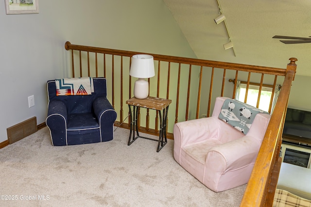 844 Red Oak Dr, Niskayuna, NY 12309 - living area featuring rail lighting, carpet, lofted ceiling, ceiling fan, and baseboards
