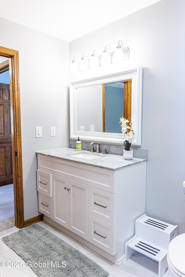 844 Red Oak Dr, Niskayuna, NY 12309 - bathroom featuring vanity, toilet, tile patterned floors, and baseboards