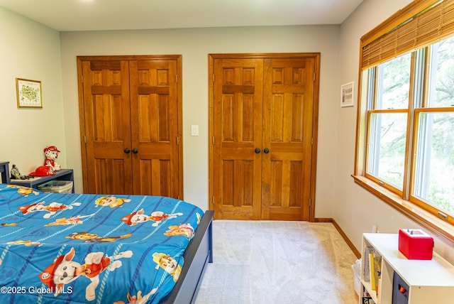 844 Red Oak Dr, Niskayuna, NY 12309 - bedroom with light colored carpet, a closet, and baseboards