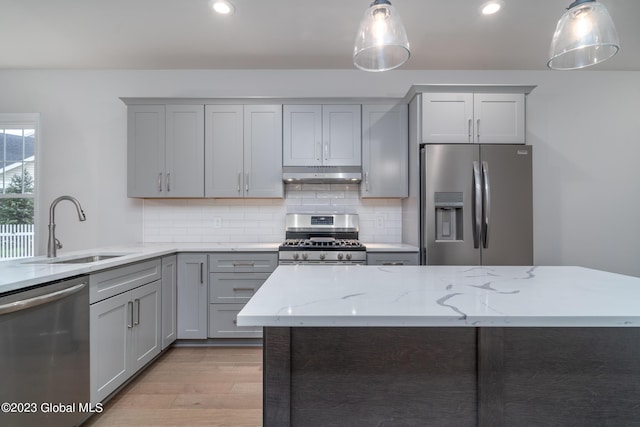 16 Priddle Ln, Colonie, NY 12110 - kitchen featuring stainless steel appliances, under cabinet range hood, a sink, gray cabinets, and recessed lighting