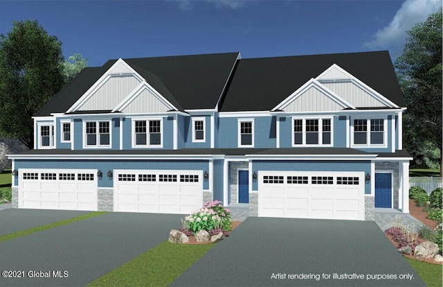 16 Priddle Ln, Colonie, NY 12110 - view of front of home featuring board and batten siding, asphalt driveway, and an attached garage