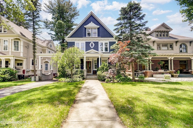 1348 Union St, Schenectady, NY 12308 - view of front of house with a front lawn and a porch