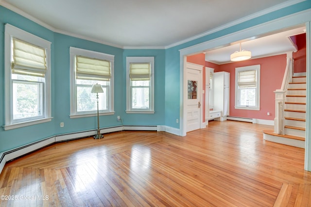 1348 Union St, Schenectady, NY 12308 - spare room with a baseboard heating unit, plenty of natural light, stairway, crown molding, and baseboards