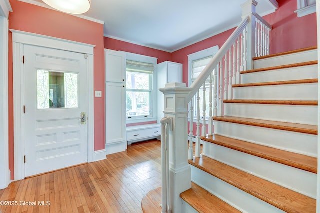 1348 Union St, Schenectady, NY 12308 - foyer with stairs, light wood-type flooring, ornamental molding, and baseboards