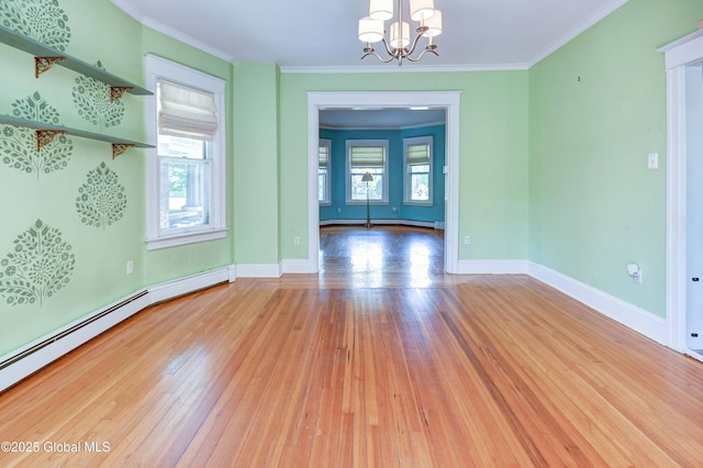 1348 Union St, Schenectady, NY 12308 - spare room featuring a chandelier, a baseboard radiator, hardwood / wood-style flooring, ornamental molding, and baseboards