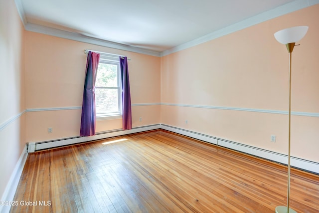 1348 Union St, Schenectady, NY 12308 - empty room featuring crown molding, wood-type flooring, baseboards, and baseboard heating