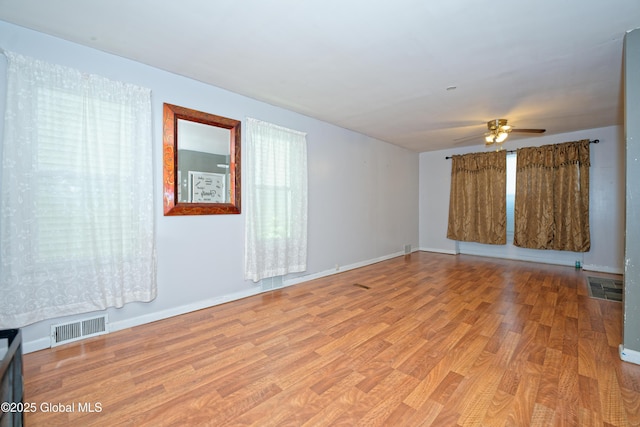 1526 6th Ave, Watervliet, NY 12189 - empty room with a ceiling fan and light wood-style flooring