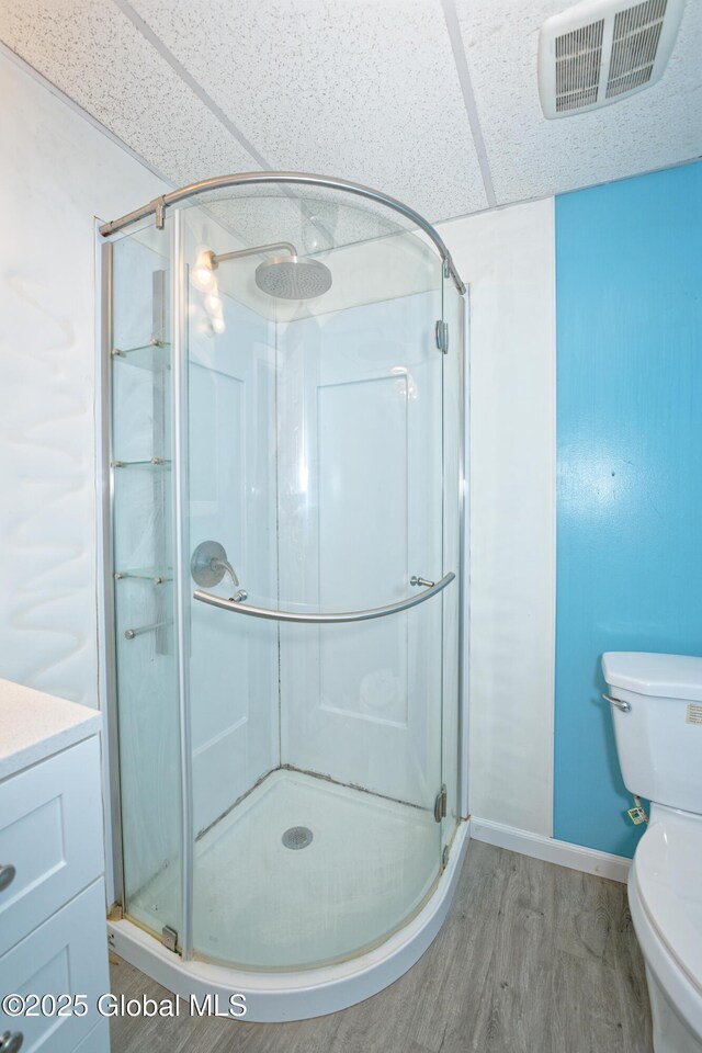 1526 6th Ave, Watervliet, NY 12189 - bathroom featuring a shower stall and wood finished floors