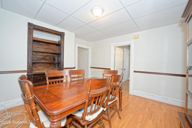 1526 6th Ave, Watervliet, NY 12189 - dining room featuring a paneled ceiling and light wood-style flooring