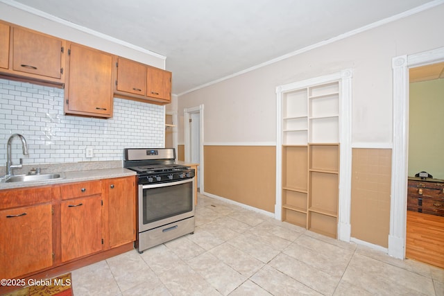 1526 6th Ave, Watervliet, NY 12189 - kitchen with stainless steel gas range oven, light countertops, decorative backsplash, crown molding, and brown cabinets