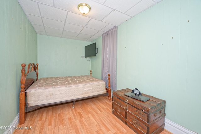 1526 6th Ave, Watervliet, NY 12189 - bedroom featuring light wood finished floors and a drop ceiling