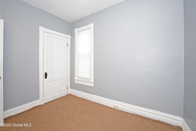 1526 6th Ave, Watervliet, NY 12189 - carpeted empty room with baseboards