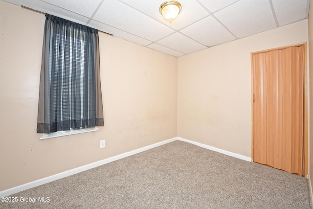 1526 6th Ave, Watervliet, NY 12189 - carpeted spare room featuring a drop ceiling and baseboards