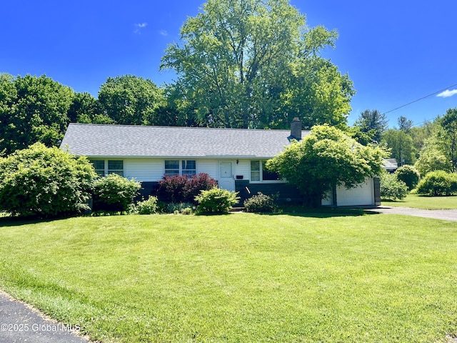 19 Lillian Dr, Glenville, NY 12302 - view of front of property featuring a garage, driveway, a front yard, a chimney, and a shingled roof