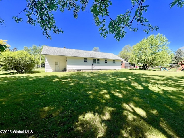 19 Lillian Dr, Glenville, NY 12302 - rear view of house featuring a yard, a playground, and crawl space