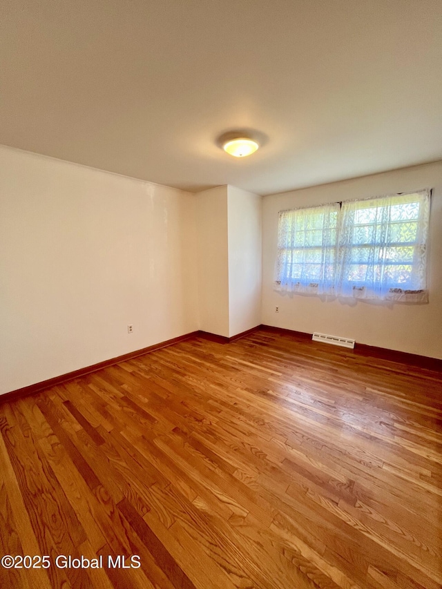 19 Lillian Dr, Glenville, NY 12302 - spare room featuring wood finished floors and baseboards